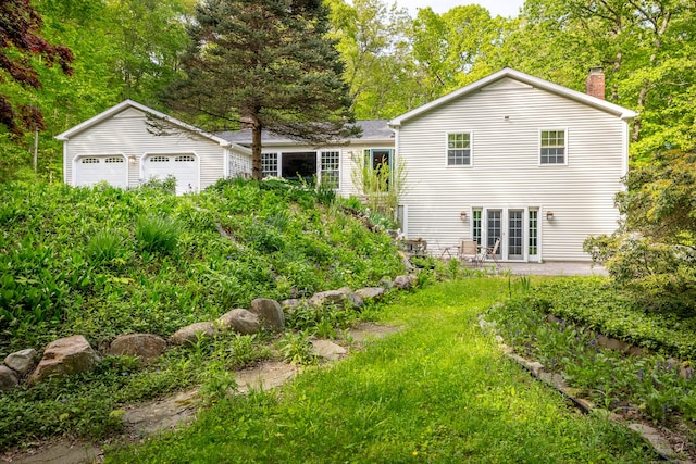 181 Picketts Ridge Rd, Redding, CT 06896 - back of house with a chimney