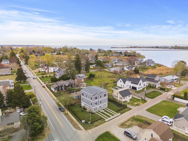 aerial view featuring a residential view and a water view