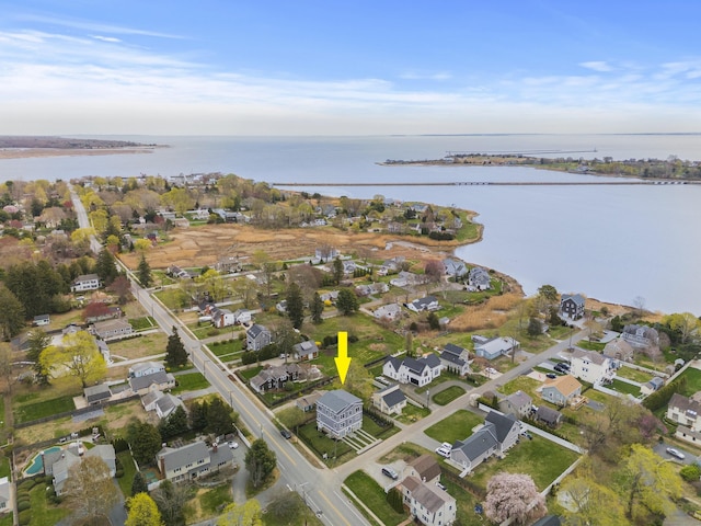 bird's eye view with a residential view and a water view