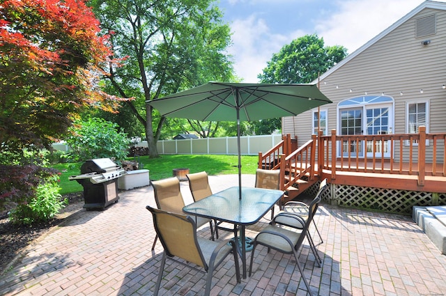 5 Middle Dr, Windsor Locks, CT 06096 - fenced backyard with a grill, a patio, a deck, and outdoor dining space