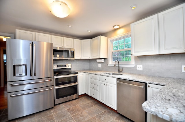 5 Middle Dr, Windsor Locks, CT 06096 - kitchen featuring stainless steel appliances, white cabinets, light stone countertops, and recessed lighting