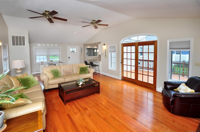 5 Middle Dr, Windsor Locks, CT 06096 - living area with vaulted ceiling, light wood finished floors, and ceiling fan