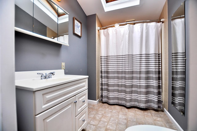5 Middle Dr, Windsor Locks, CT 06096 - bathroom featuring a skylight, vanity, and curtained shower