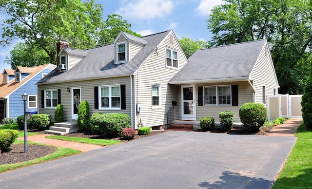 5 Middle Dr, Windsor Locks, CT 06096 - cape cod house with a shingled roof and a chimney
