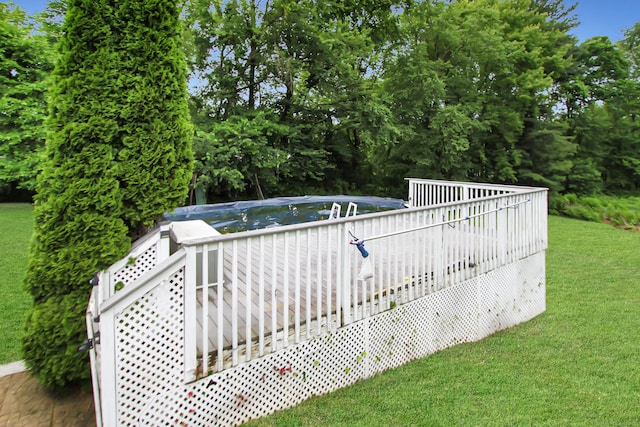 15 Old Stream Ln, Trumbull, CT 06611 - view of green lawn featuring a deck and view of wooded area