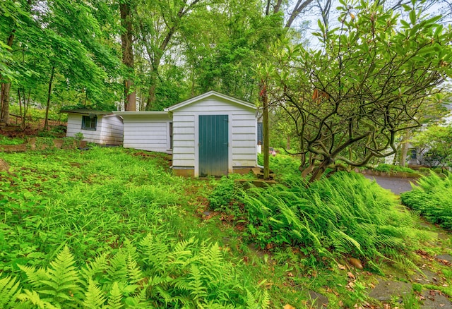 64 Blake Rd, Hamden, CT 06517 - view of shed featuring view of wooded area