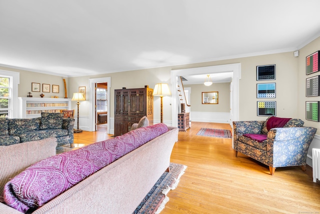 64 Blake Rd, Hamden, CT 06517 - living area with light wood finished floors and ornamental molding