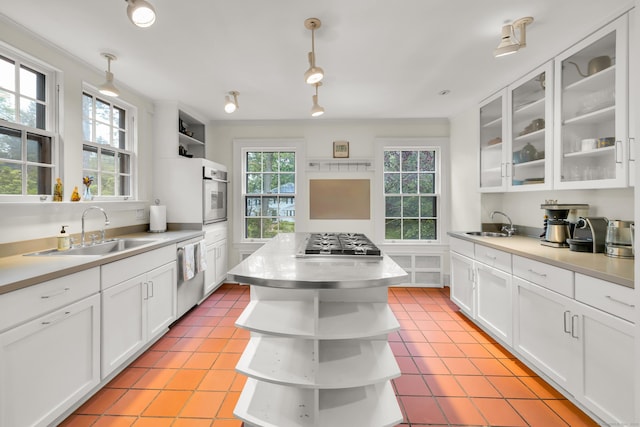64 Blake Rd, Hamden, CT 06517 - kitchen featuring open shelves, appliances with stainless steel finishes, white cabinetry, and crown molding