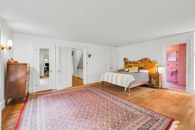 64 Blake Rd, Hamden, CT 06517 - bedroom with wood finished floors and baseboards