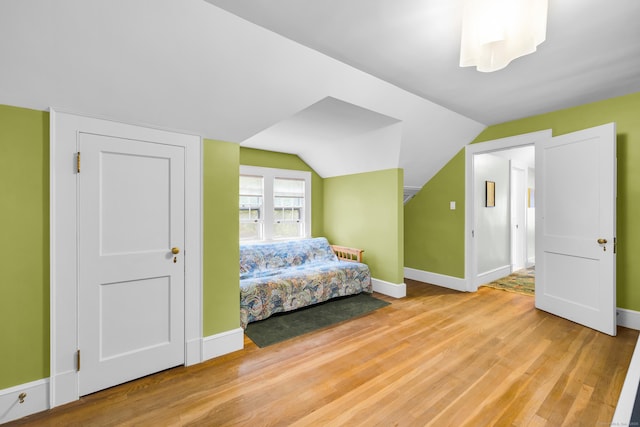 64 Blake Rd, Hamden, CT 06517 - bedroom with light wood-style floors and vaulted ceiling