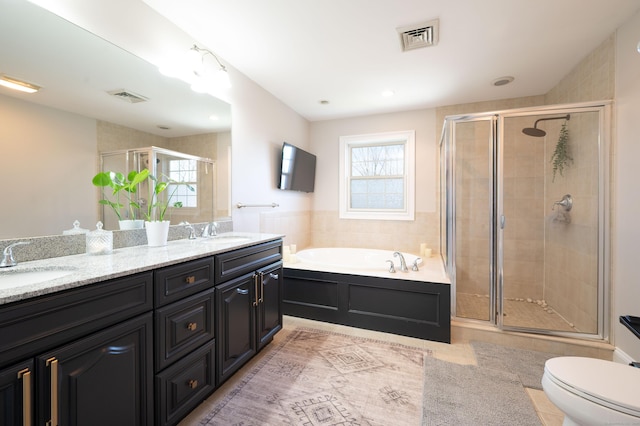 full bath featuring visible vents, a sink, and a stall shower