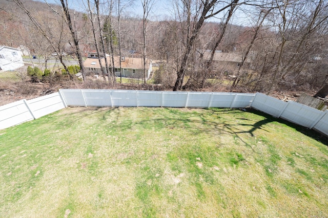 view of yard featuring a fenced backyard