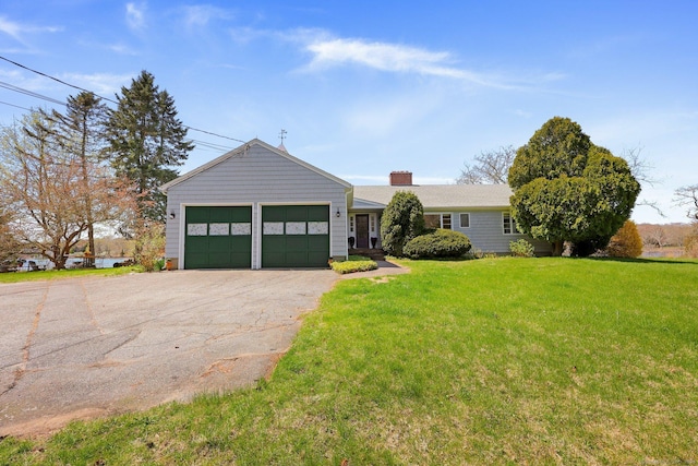 27 Wilbur Rd, Stonington, CT 06378 - ranch-style house with an attached garage, a front yard, asphalt driveway, and a chimney