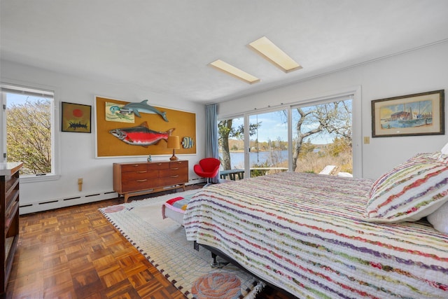 27 Wilbur Rd, Stonington, CT 06378 - bedroom featuring access to outside, a water view, multiple windows, and a baseboard radiator