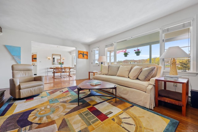 27 Wilbur Rd, Stonington, CT 06378 - living room with wood finished floors and baseboards