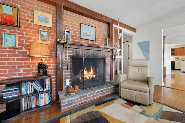 27 Wilbur Rd, Stonington, CT 06378 - living area featuring hardwood / wood-style flooring and a fireplace