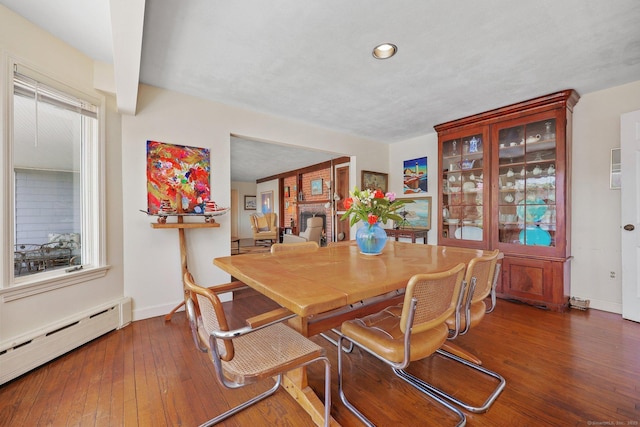 27 Wilbur Rd, Stonington, CT 06378 - dining space with baseboard heating, hardwood / wood-style floors, baseboards, and recessed lighting