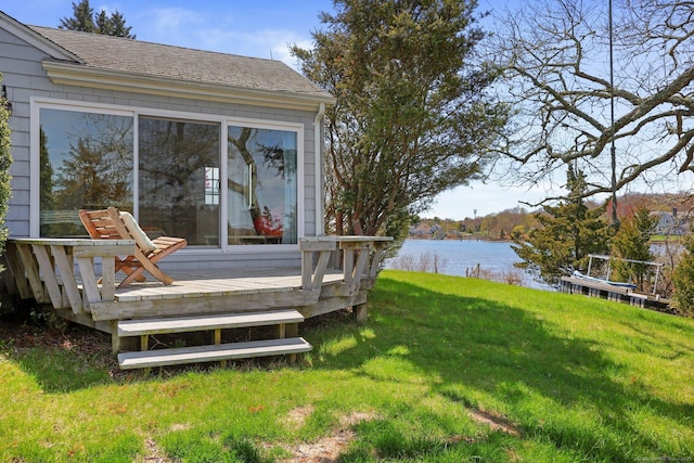 27 Wilbur Rd, Stonington, CT 06378 - view of grassy yard featuring a deck with water view