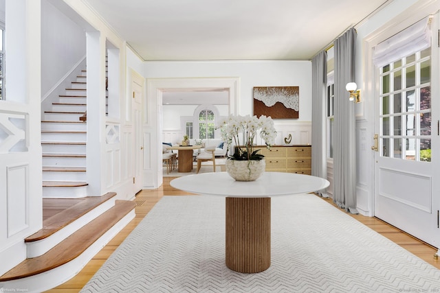 Rogers Is, Branford, CT 06405 - entrance foyer with stairs and light wood finished floors