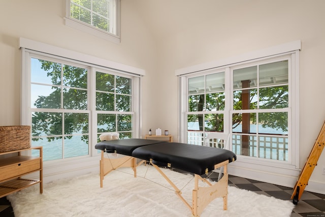 Rogers Is, Branford, CT 06405 - office with tile patterned floors, healthy amount of natural light, a towering ceiling, and a water view