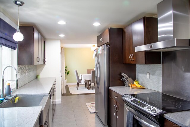 5 Shannon Rdg, Danbury, CT 06810 - kitchen with light tile patterned floors, a sink, wall chimney range hood, appliances with stainless steel finishes, and dark brown cabinets
