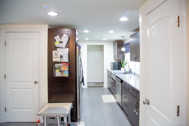 5 Shannon Rdg, Danbury, CT 06810 - kitchen with light tile patterned floors, recessed lighting, appliances with stainless steel finishes, a sink, and light countertops