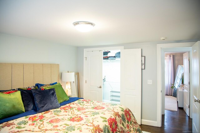 5 Shannon Rdg, Danbury, CT 06810 - bedroom featuring dark wood-style floors, multiple windows, and baseboards