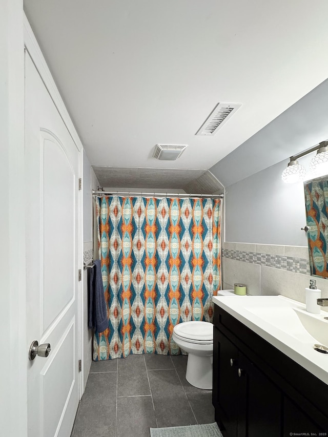 5 Shannon Rdg, Danbury, CT 06810 - bathroom with toilet, visible vents, tile walls, and tile patterned flooring