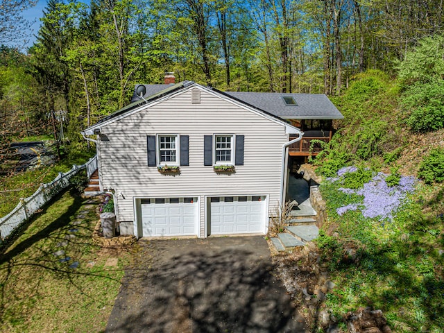 173 Barlow Mountain Rd, Ridgefield, CT 06877 - view of front of house featuring driveway, a garage, and a chimney