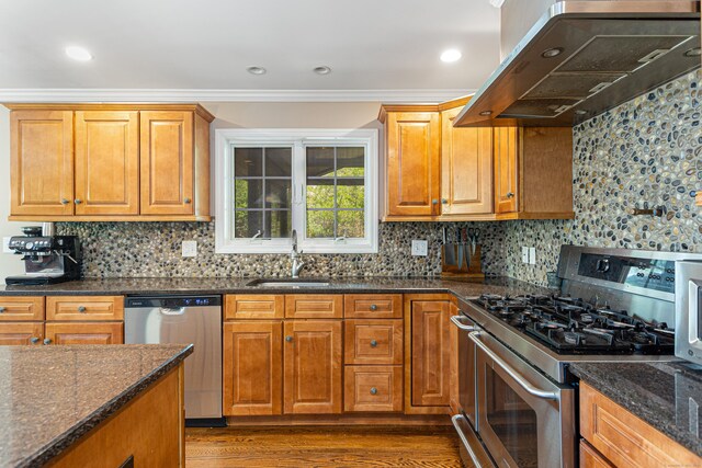 173 Barlow Mountain Rd, Ridgefield, CT 06877 - kitchen featuring stainless steel appliances, range hood, crown molding, dark stone counters, and decorative backsplash