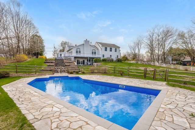 186 Isinglass Rd, Shelton, CT 06484 - view of swimming pool featuring a lawn, a fenced backyard, and a fenced in pool