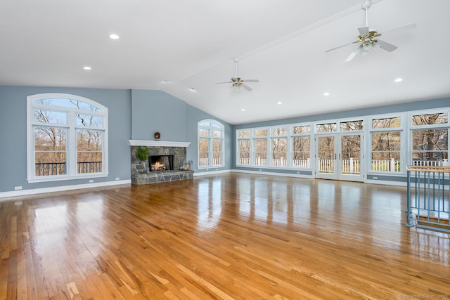186 Isinglass Rd, Shelton, CT 06484 - unfurnished living room with baseboards, ceiling fan, wood finished floors, and vaulted ceiling