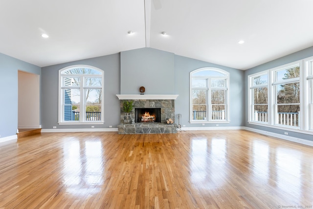 186 Isinglass Rd, Shelton, CT 06484 - unfurnished living room featuring baseboards, vaulted ceiling, and light wood-style floors