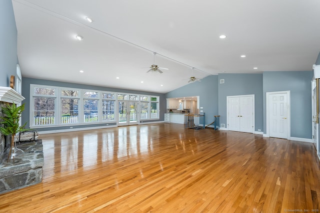 186 Isinglass Rd, Shelton, CT 06484 - unfurnished living room featuring a ceiling fan, vaulted ceiling, baseboards, recessed lighting, and hardwood / wood-style floors