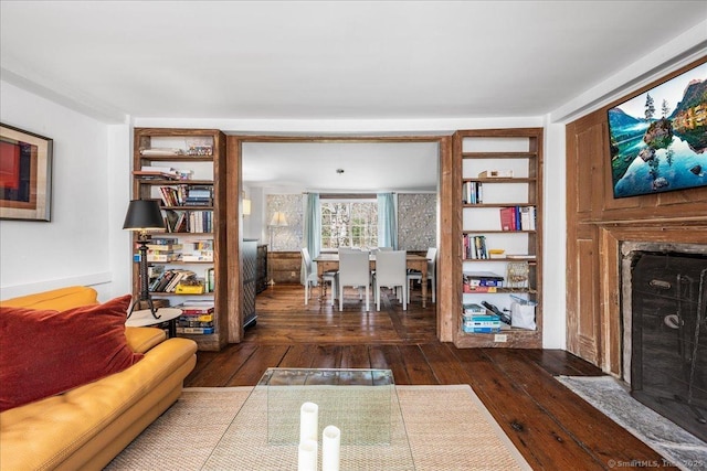 45 Main St, Essex, CT 06442 - living area with a premium fireplace and dark wood finished floors