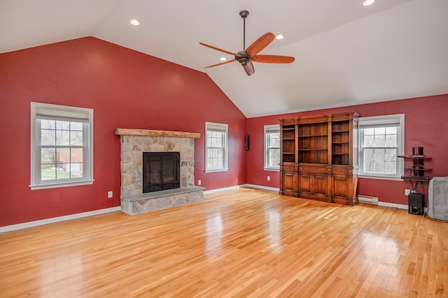 39 Overlook Dr, New Milford, CT 06776 - unfurnished living room featuring wood finished floors, a fireplace, ceiling fan, baseboard heating, and high vaulted ceiling