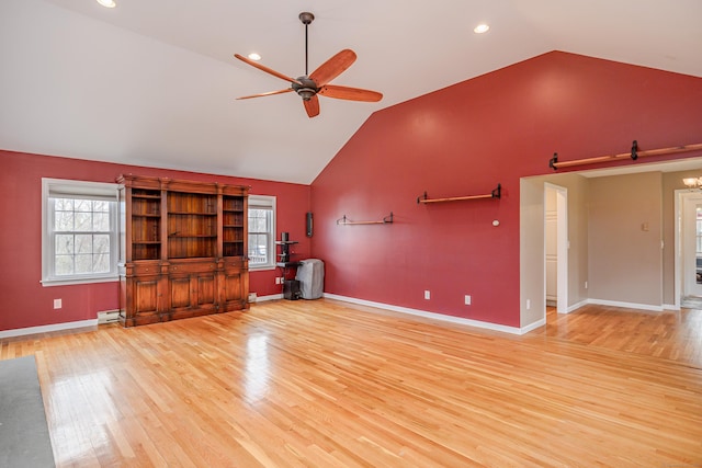 39 Overlook Dr, New Milford, CT 06776 - unfurnished living room with ceiling fan, vaulted ceiling, a wealth of natural light, and light wood finished floors