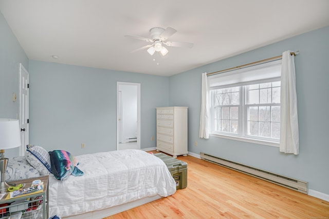 39 Overlook Dr, New Milford, CT 06776 - bedroom featuring baseboards, a ceiling fan, a baseboard heating unit, and wood finished floors