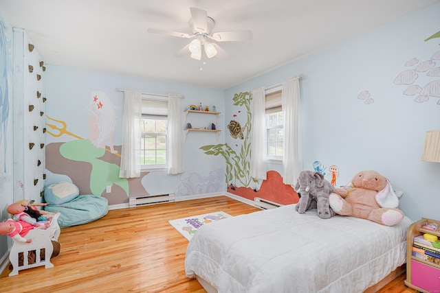 39 Overlook Dr, New Milford, CT 06776 - bedroom with multiple windows, baseboard heating, and wood finished floors