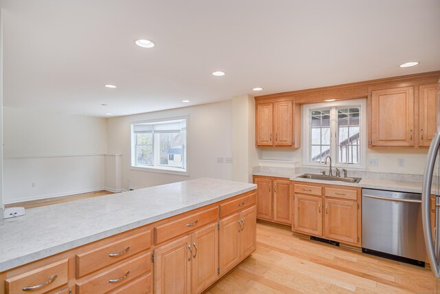 39 Overlook Dr, New Milford, CT 06776 - kitchen with stainless steel dishwasher, a sink, light countertops, recessed lighting, and light wood-style flooring