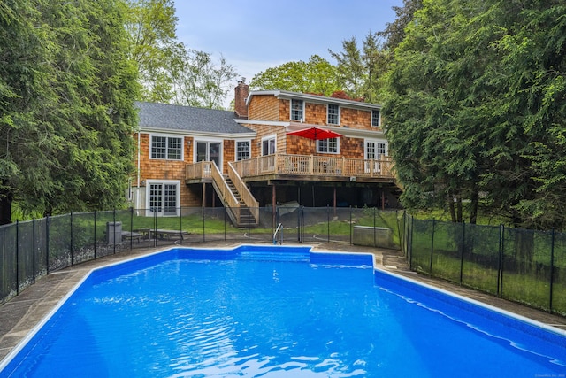 27 Blue Ribbon Dr, Westport, CT 06880 - view of pool with stairs, a deck, and a fenced backyard