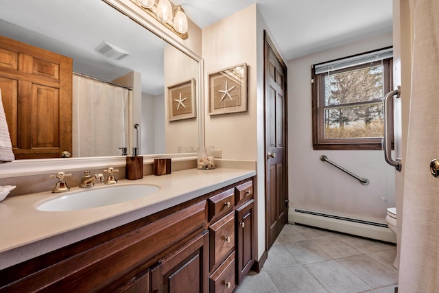 bathroom with vanity, a baseboard heating unit, tile patterned flooring, toilet, and visible vents