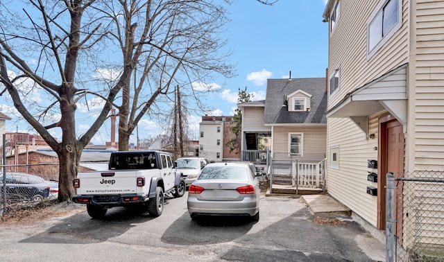 36 Gilbert St, Waterbury, CT 06702 - view of car parking featuring fence