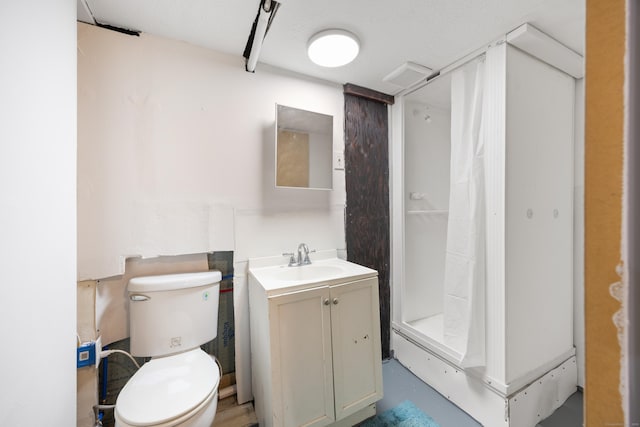 bathroom with visible vents, toilet, and vanity