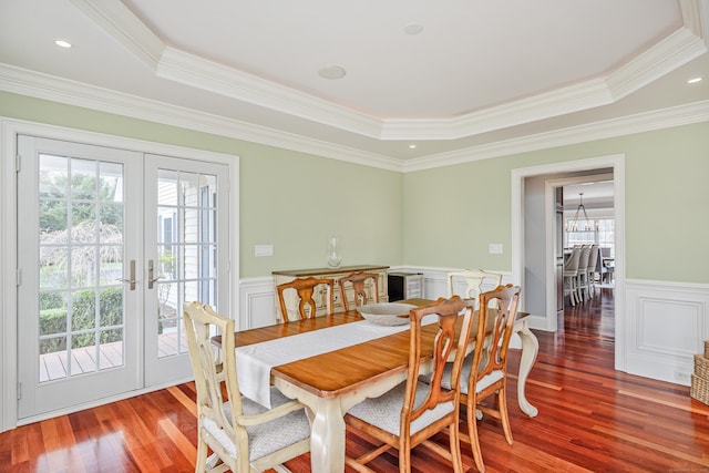 48 Mount Nebo Rd, Newtown, CT 06470 - dining space featuring wood finished floors, french doors, wainscoting, crown molding, and a decorative wall