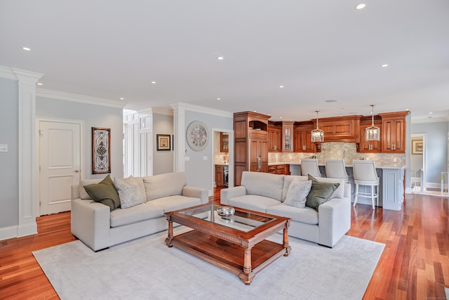 48 Mount Nebo Rd, Newtown, CT 06470 - living area featuring recessed lighting, light wood-style flooring, ornamental molding, baseboards, and ornate columns