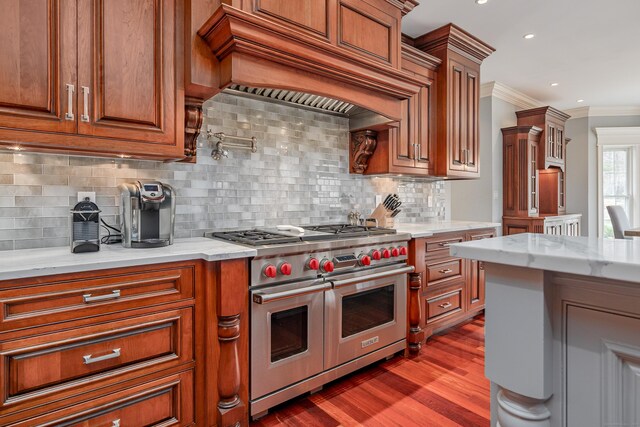 48 Mount Nebo Rd, Newtown, CT 06470 - kitchen featuring range with two ovens, ornamental molding, light stone countertops, dark wood finished floors, and brown cabinetry
