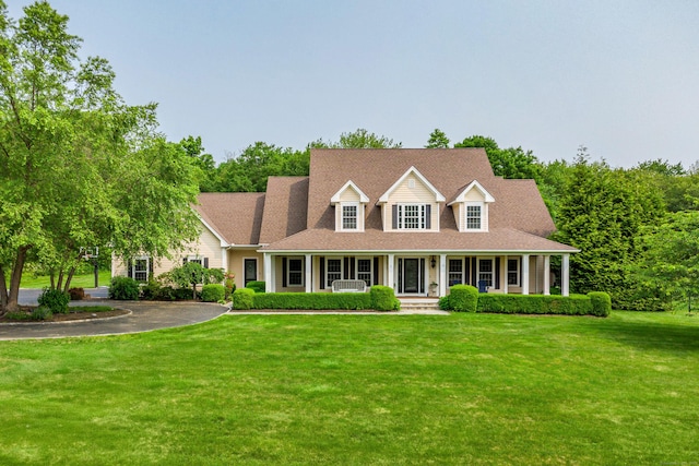 48 Mount Nebo Rd, Newtown, CT 06470 - view of front of house with covered porch, a front yard, and asphalt driveway