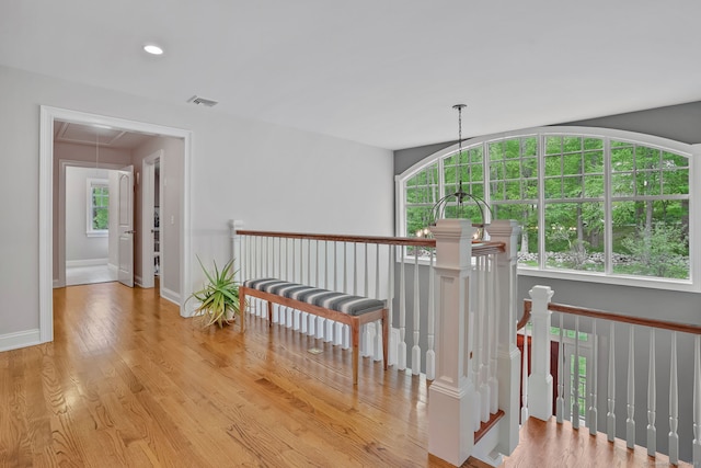 211 Linden Tree Rd, Wilton, CT 06897 - hallway featuring wood finished floors, an upstairs landing, baseboards, and recessed lighting