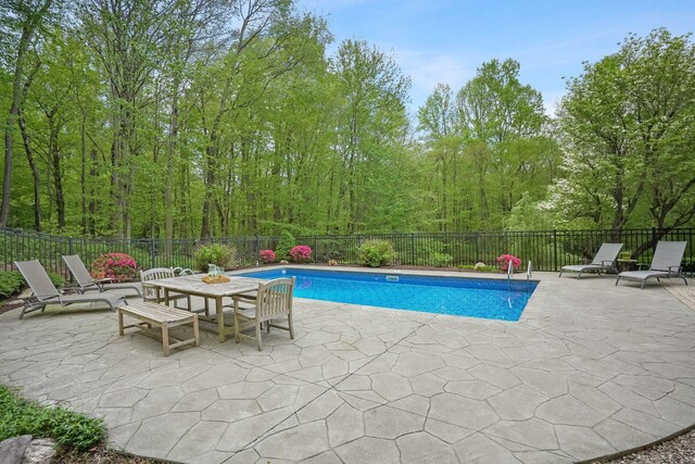 211 Linden Tree Rd, Wilton, CT 06897 - view of pool featuring a patio area, a fenced backyard, and outdoor dining space